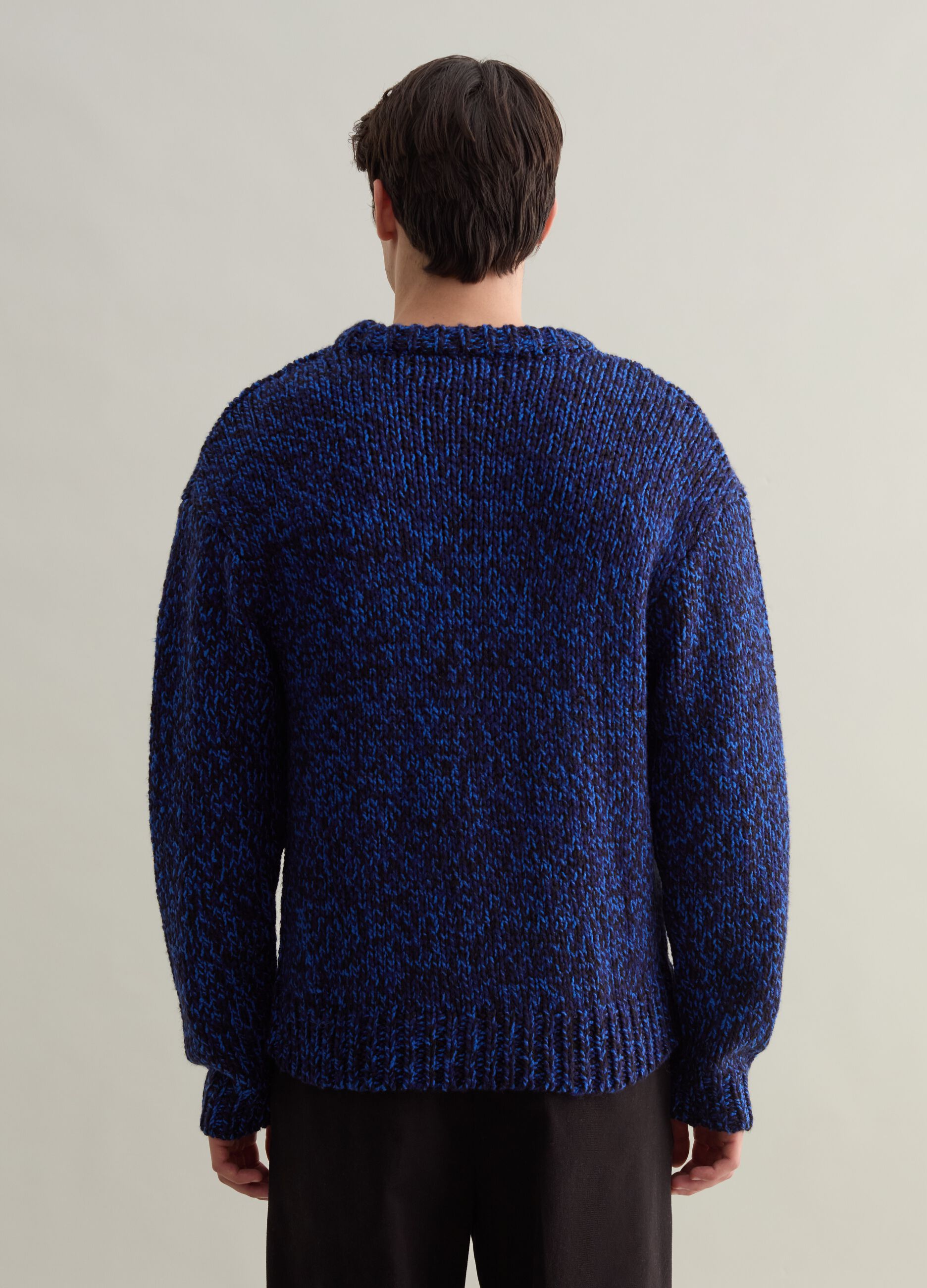 Pullover with two-tone twist effect design