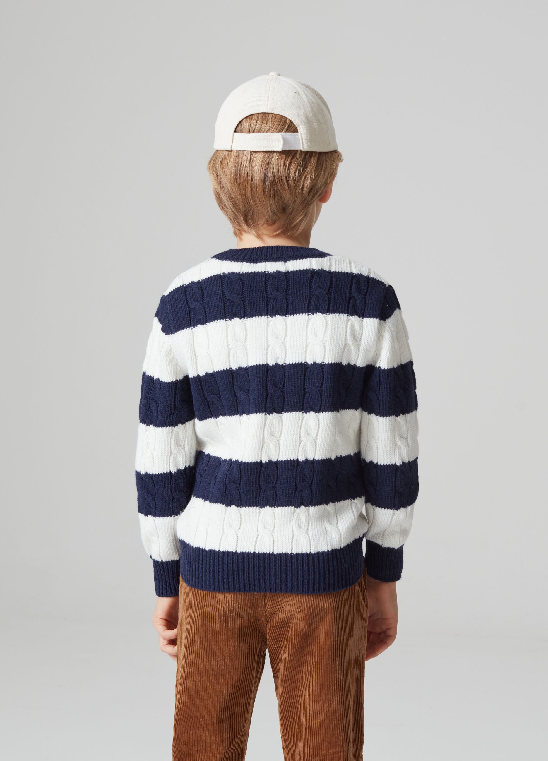 Striped pullover with cable-knit design