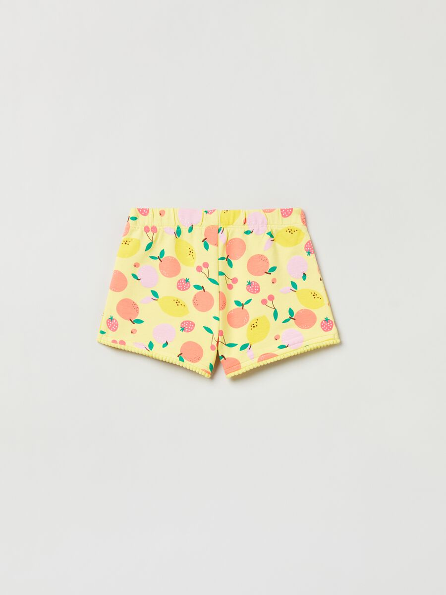 French terry shorts with print and pompoms_1