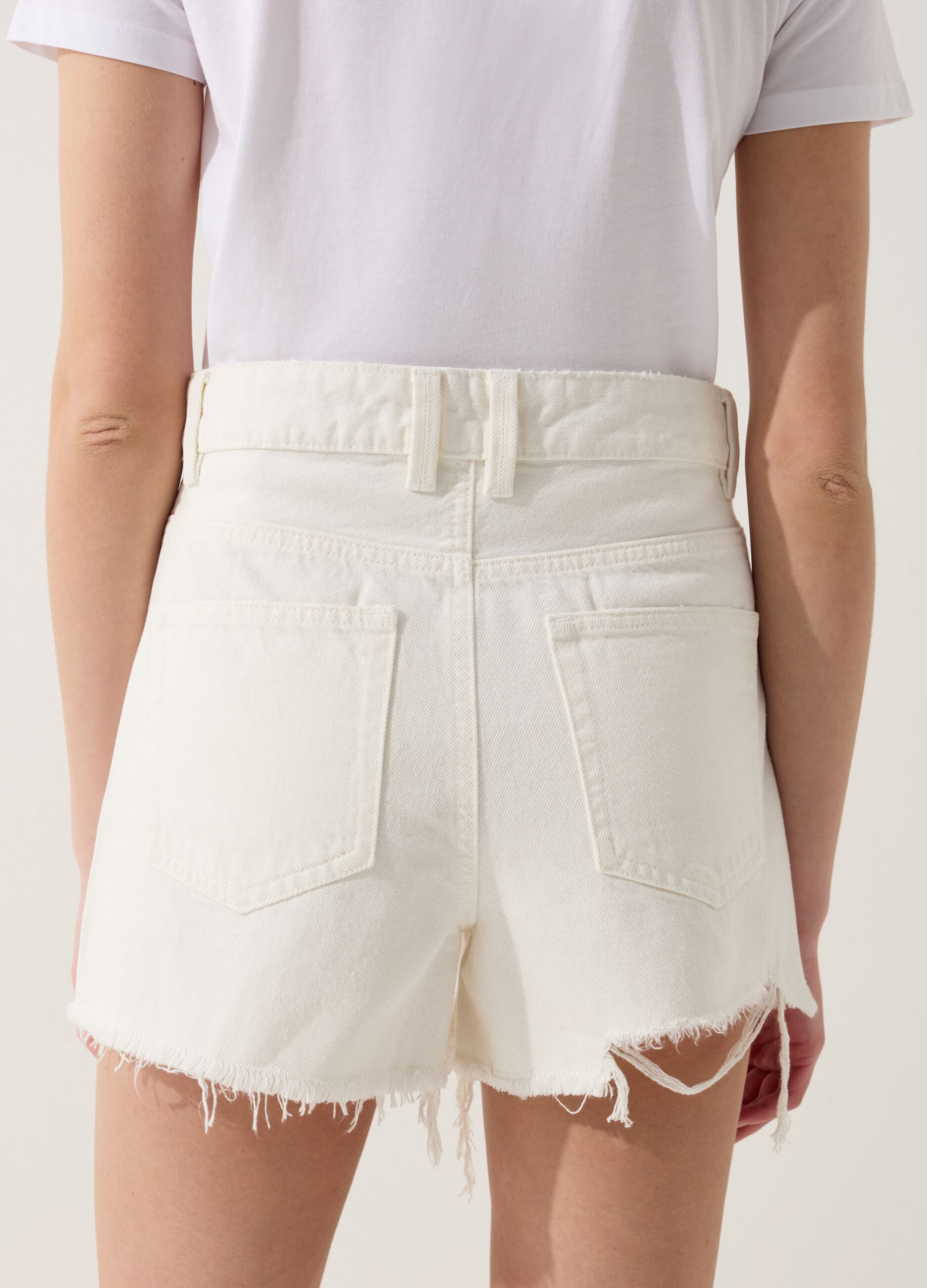 Denim shorts with rips and high waist