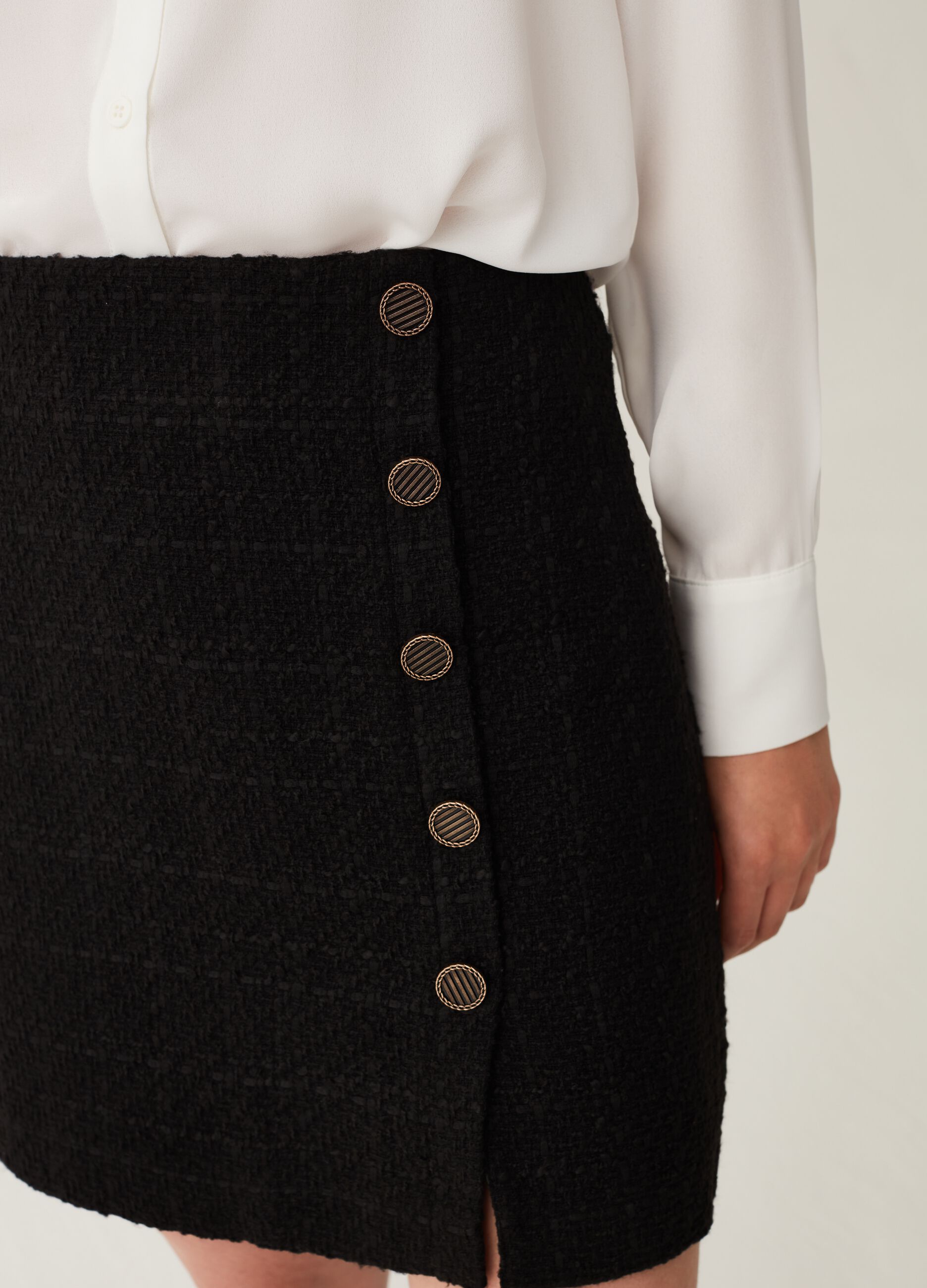 Tweed miniskirt with buttons