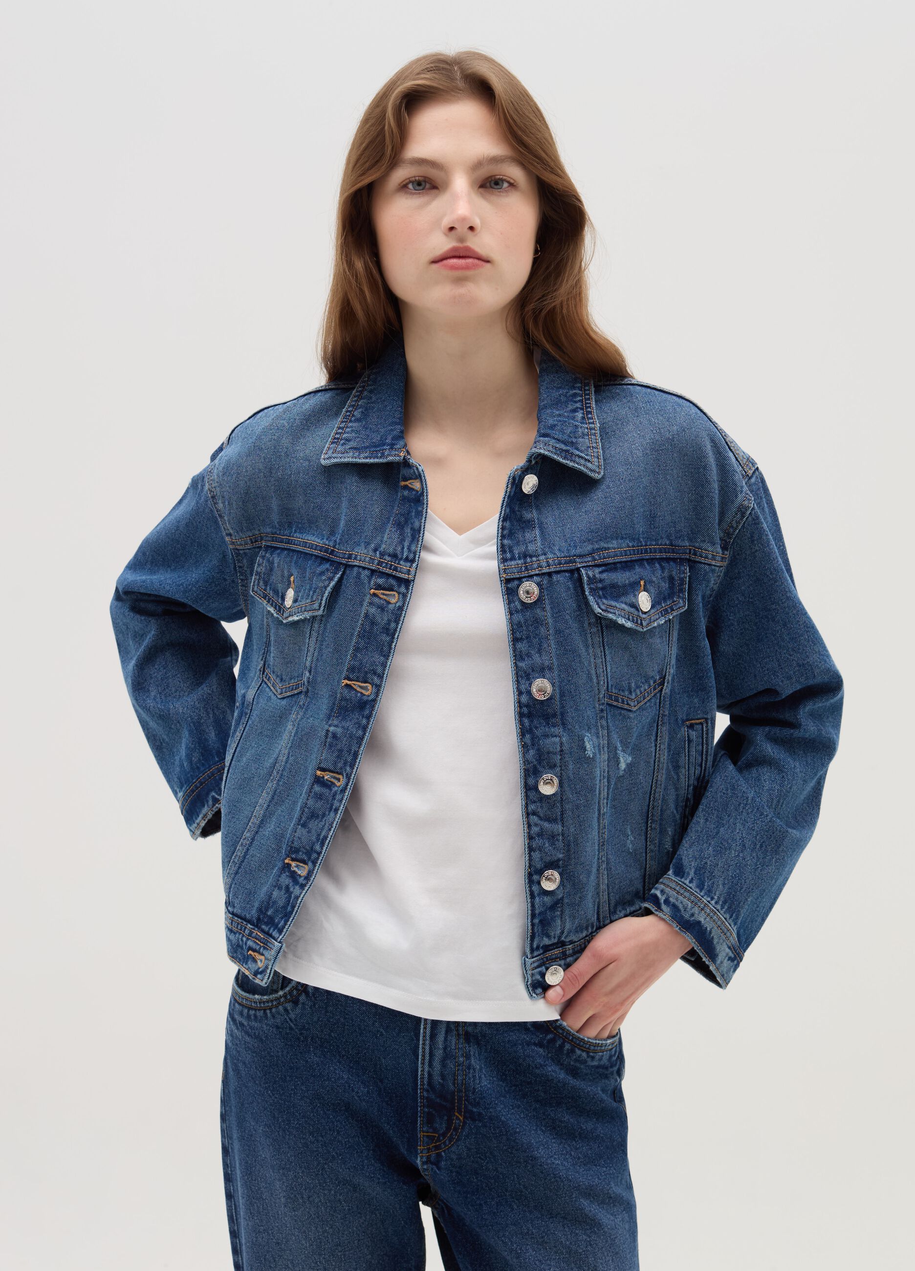 Denim jacket with abrasions