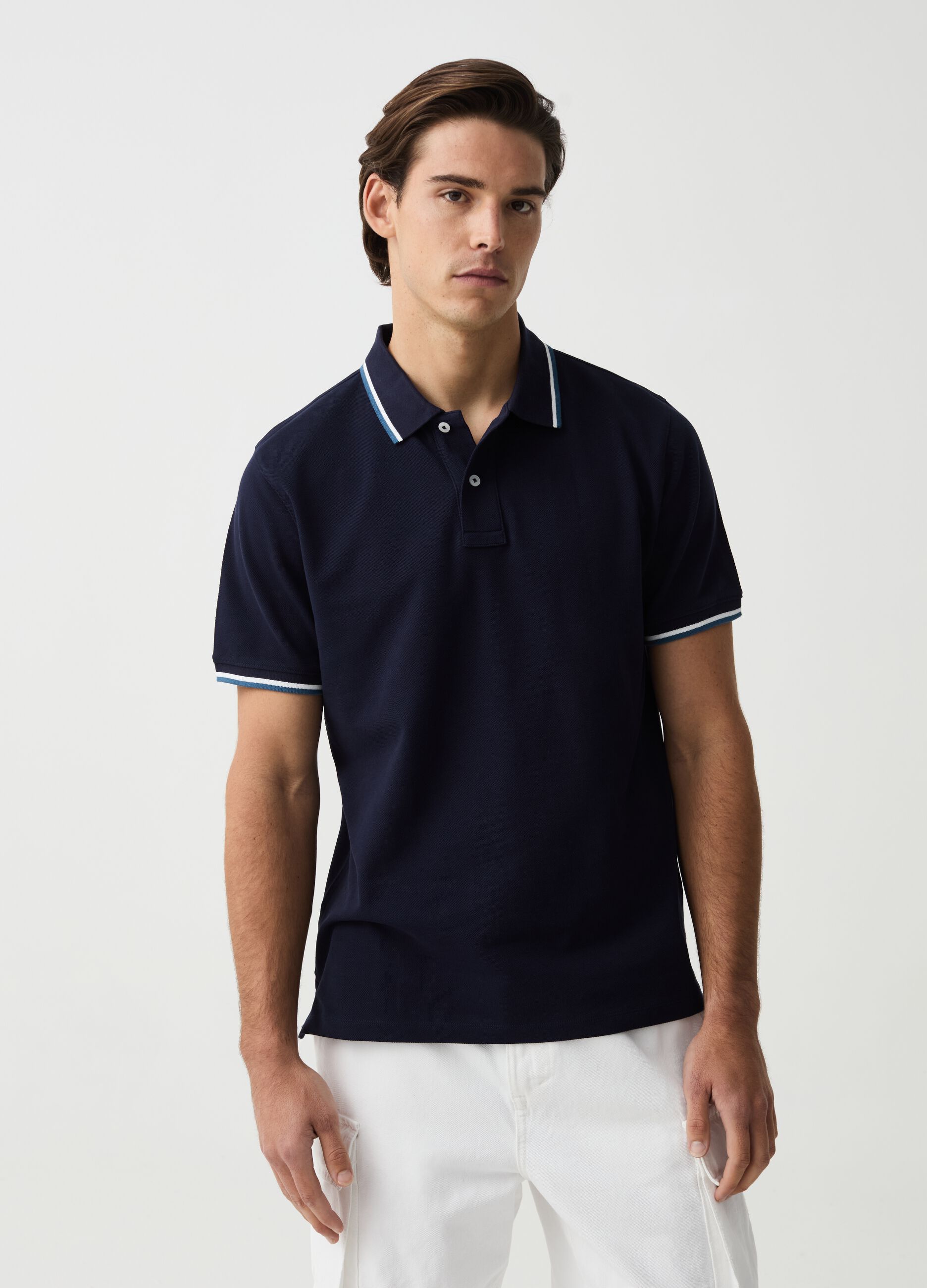 Polo shirt in piquet with striped edging