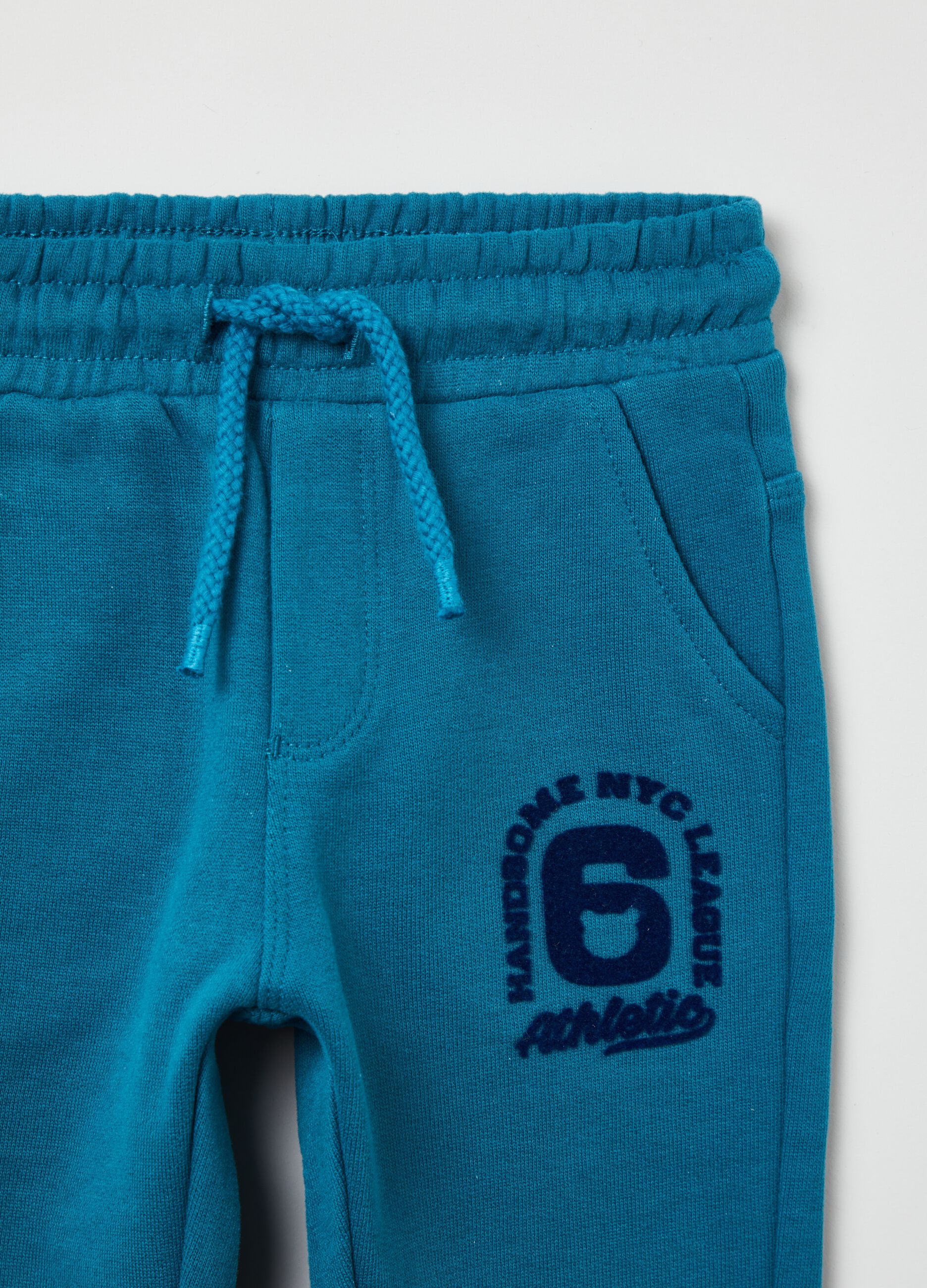 Fleece joggers with drawstring and print