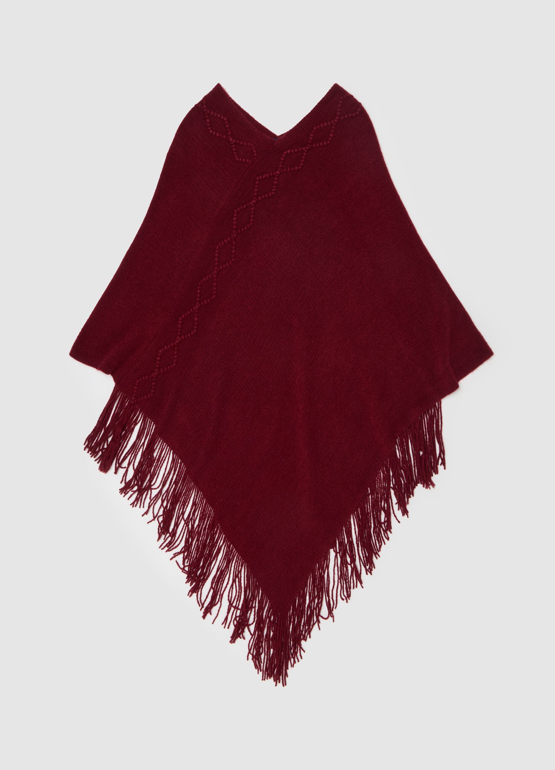 Poncho with diamond design and fringing