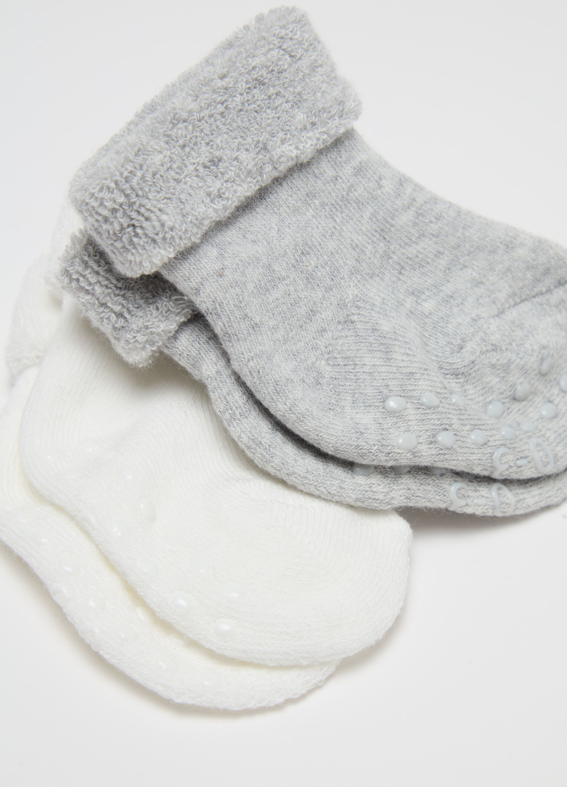 Four-pair pack socks in solid colour terry