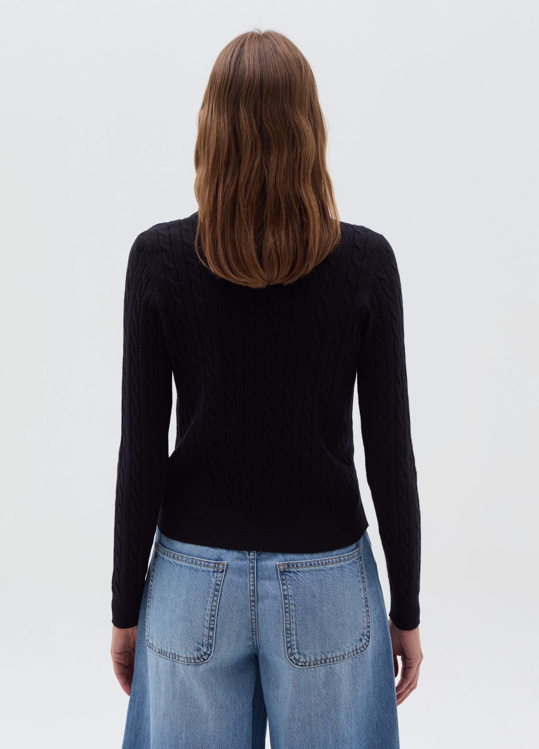 Ribbed pullover with cable-knit design