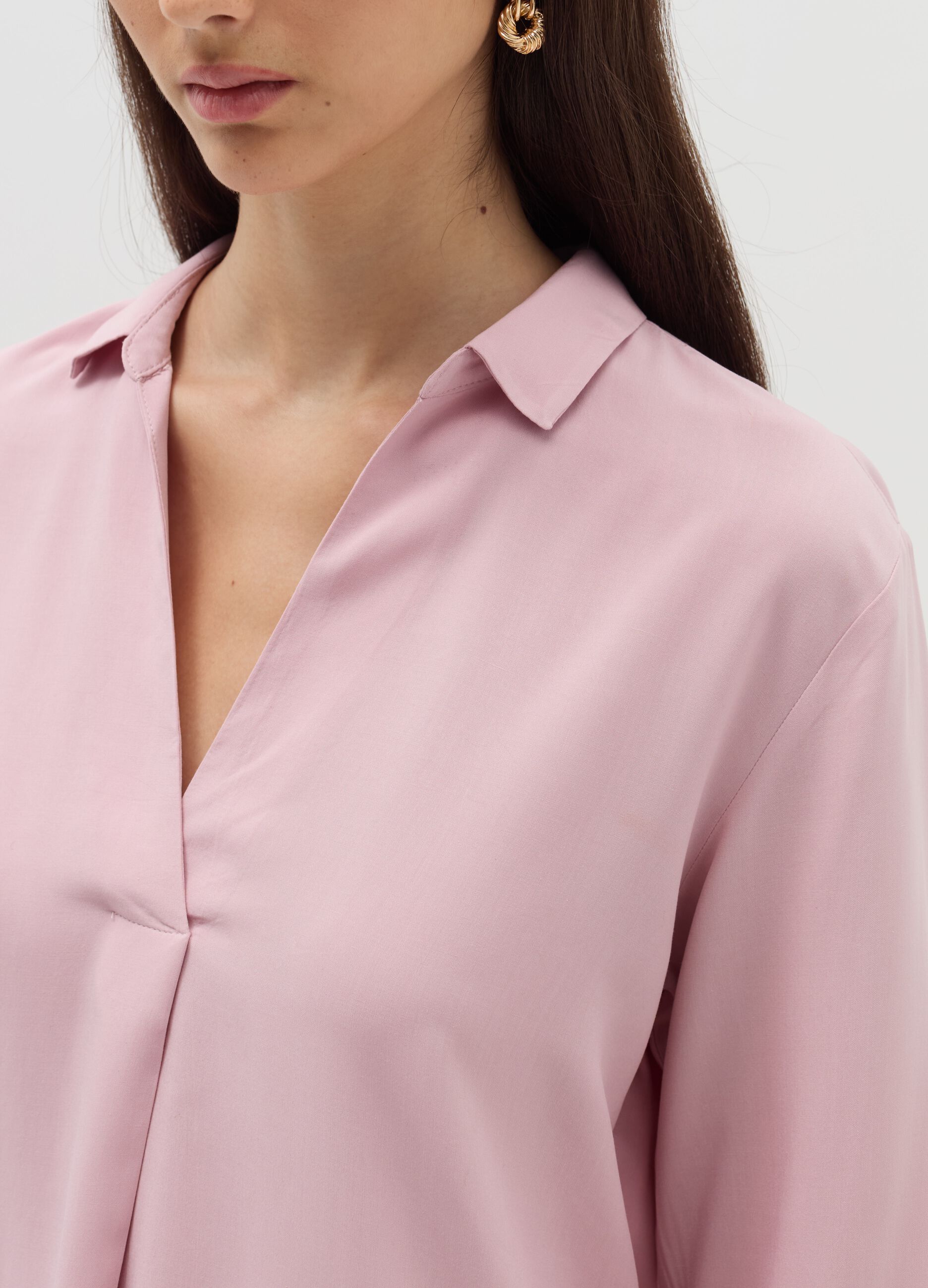 Blouse with polo neckline and long sleeves