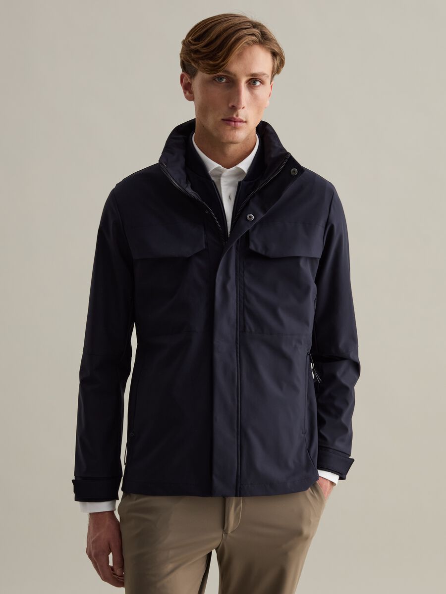 Short jacket in technical fabric with high neck_1