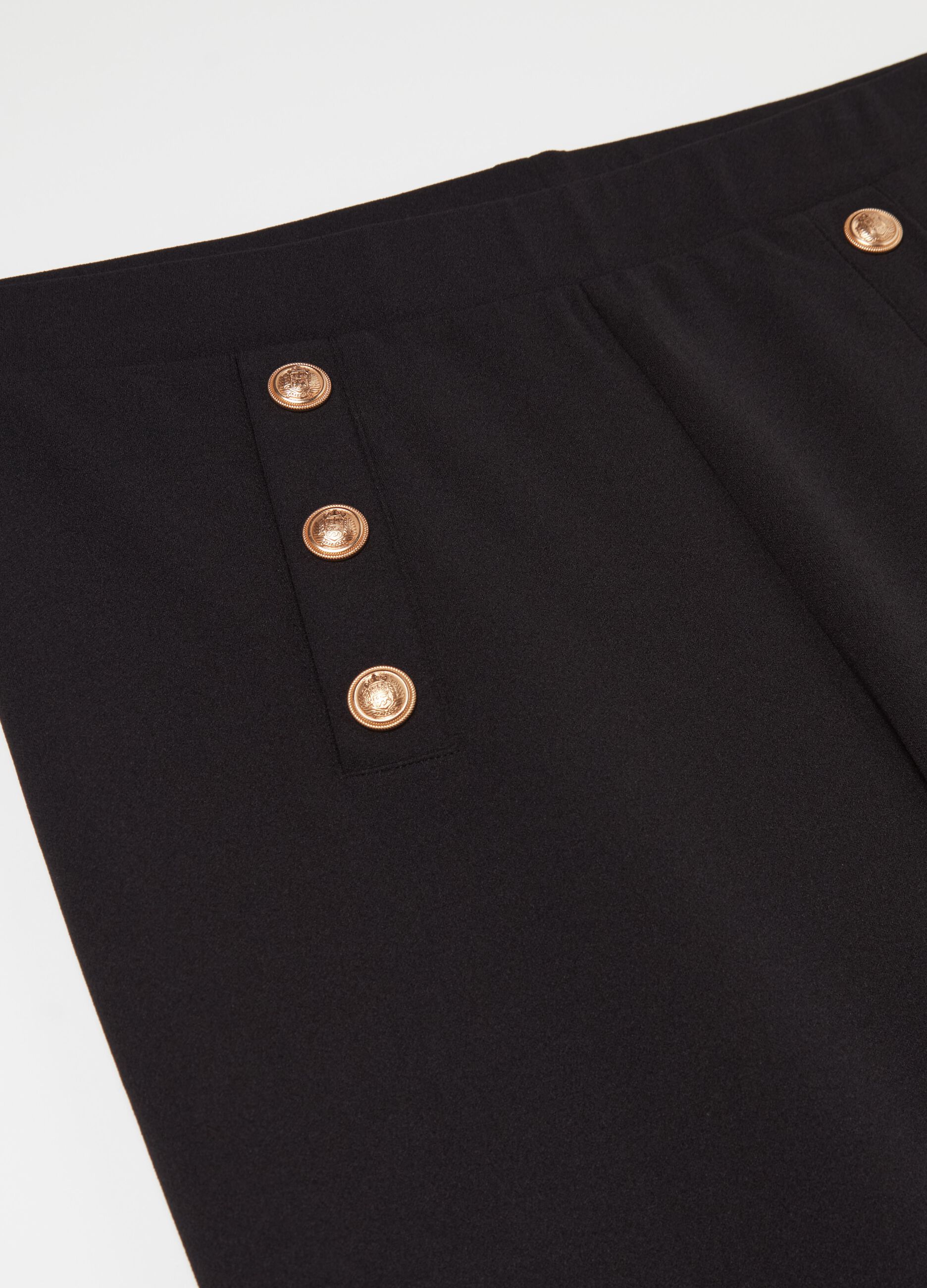 Wide trousers with buttons