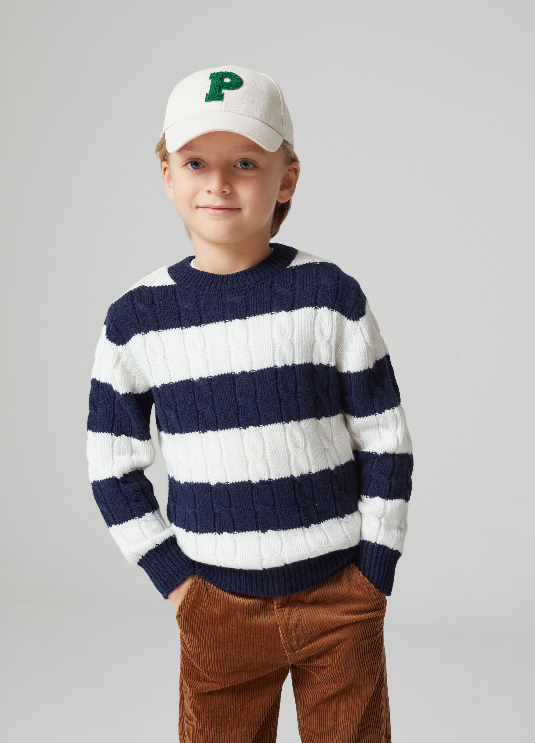 Striped pullover with cable-knit design