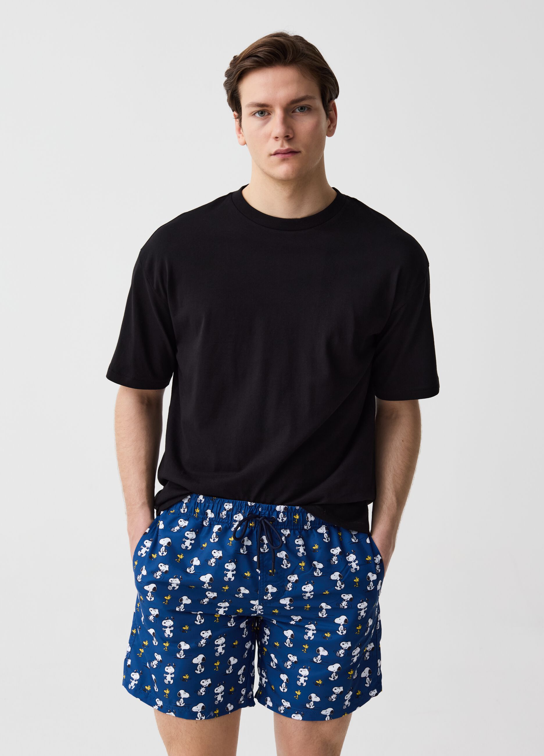 Swimming trunks with Snoopy print