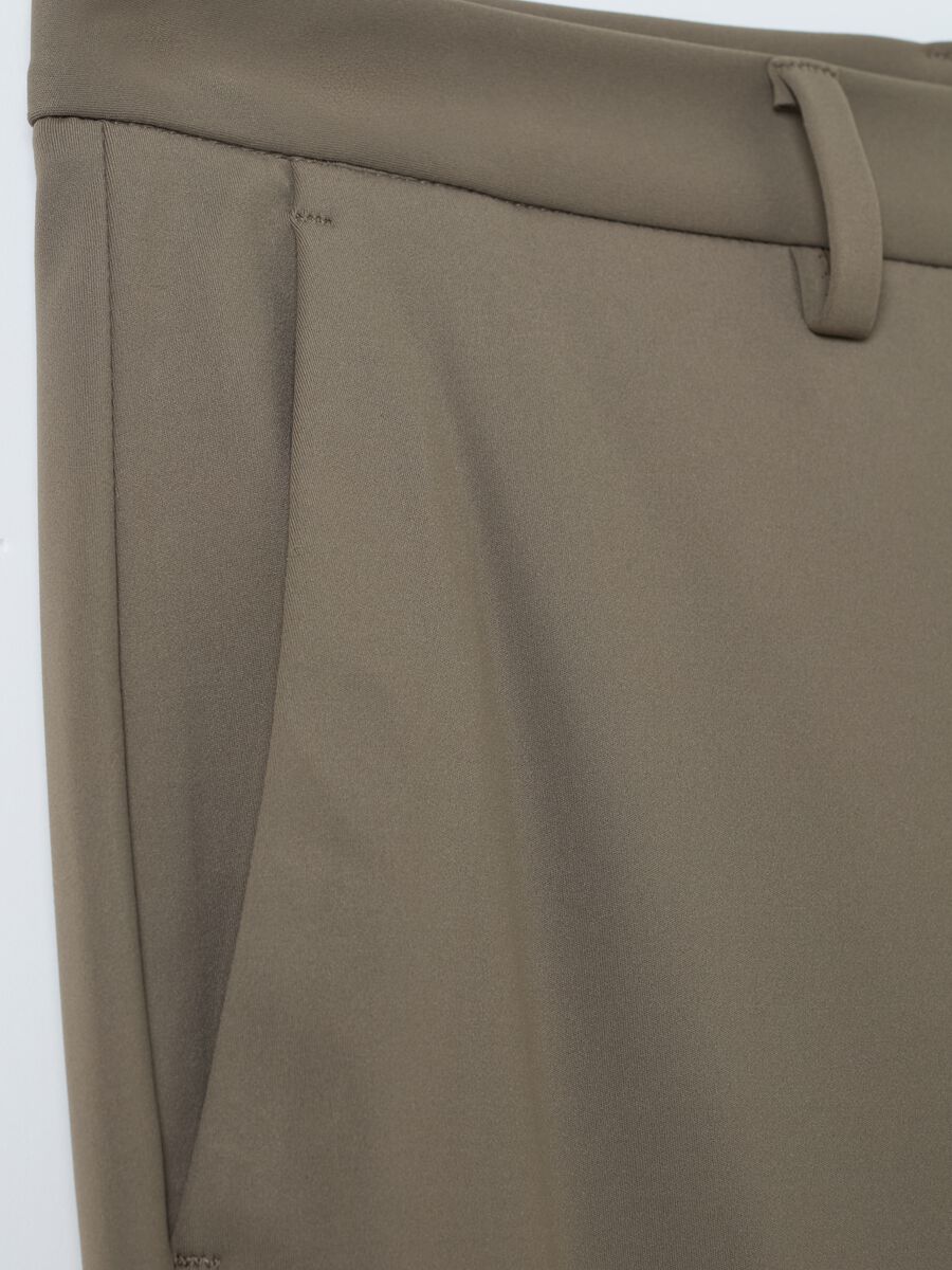 Contemporary chino trousers in technical fabric_5