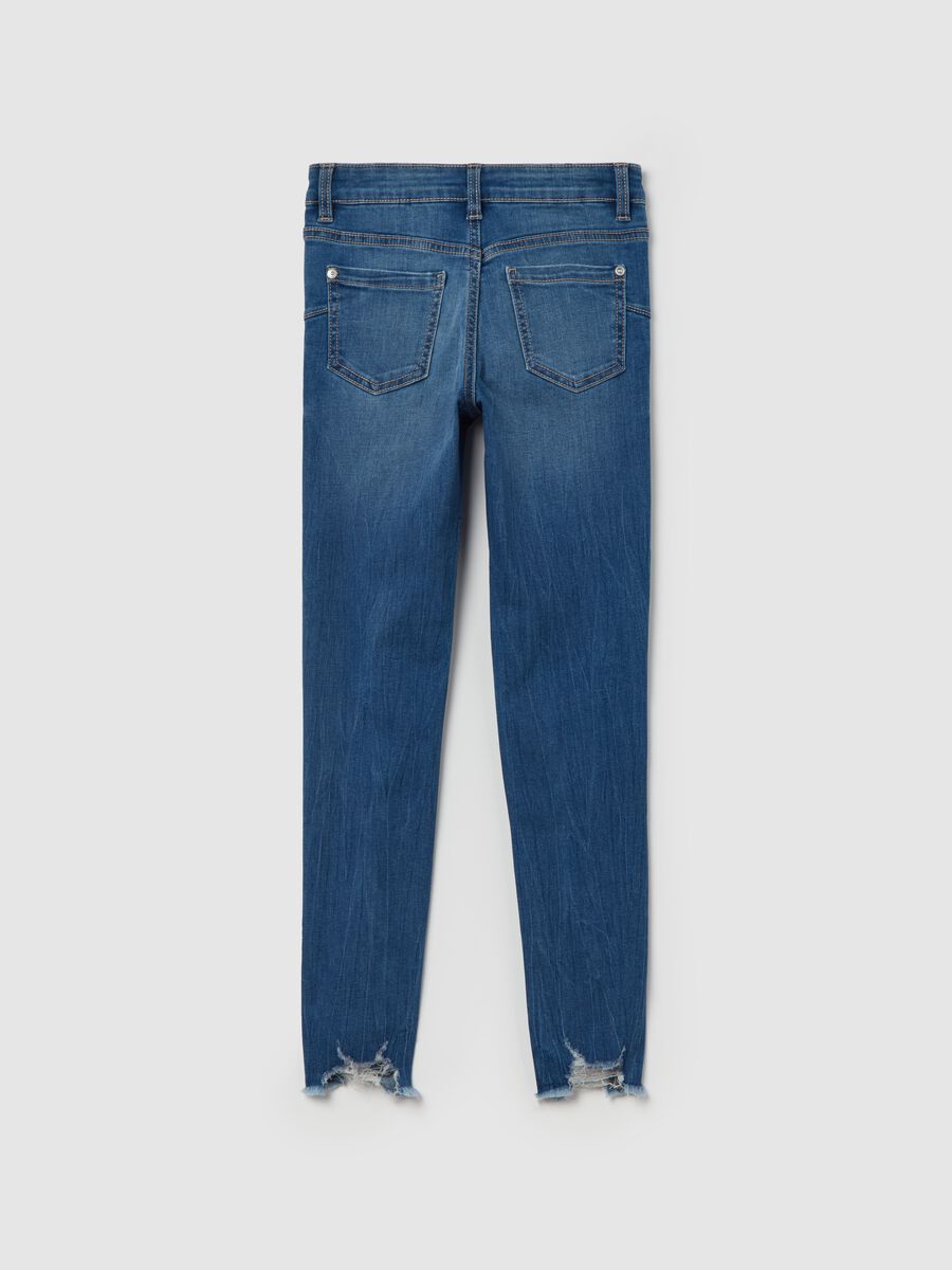 Slim-fit destroyed jeans with five pockets_4