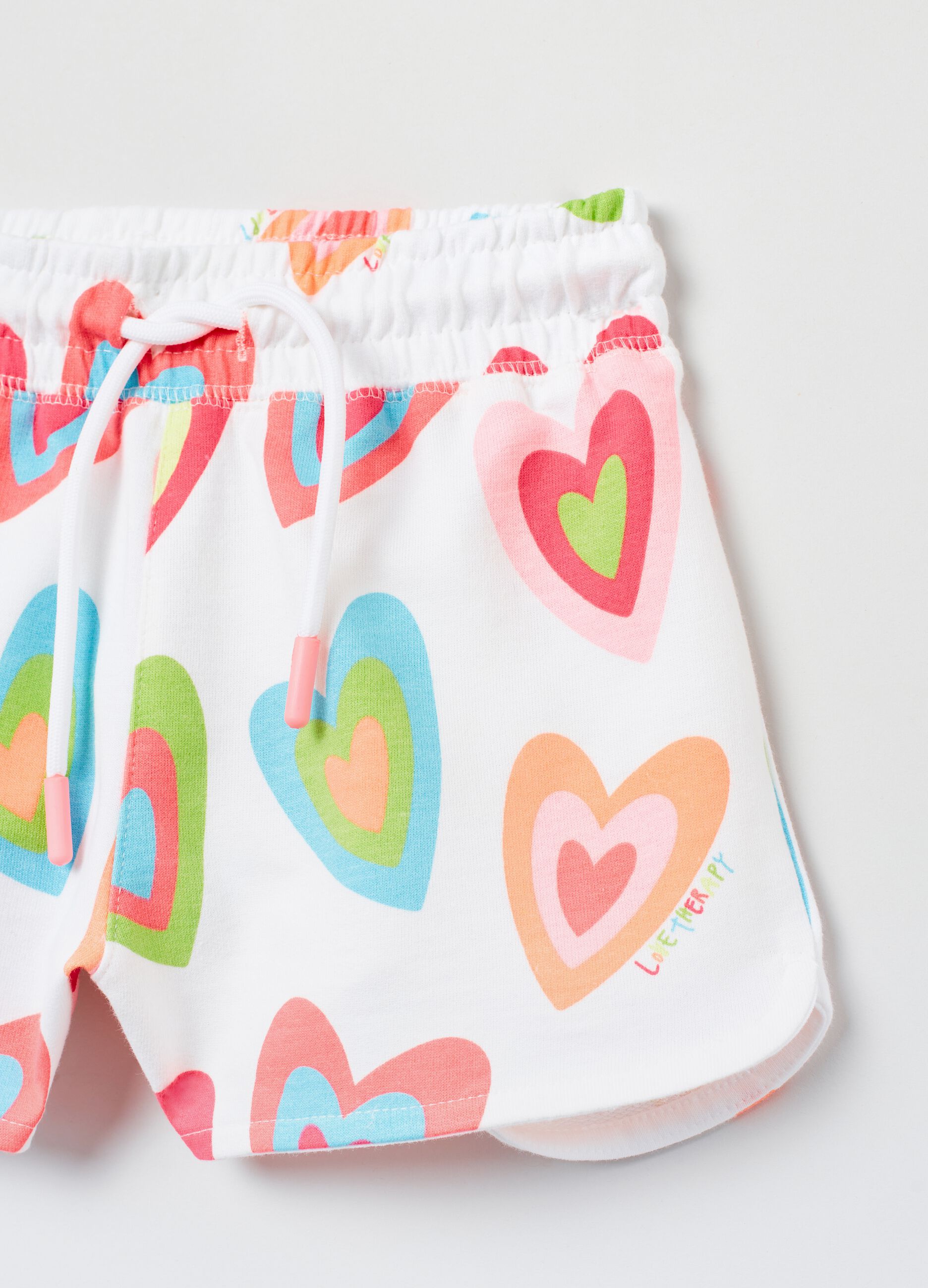 Cotton shorts with Love Therapy print