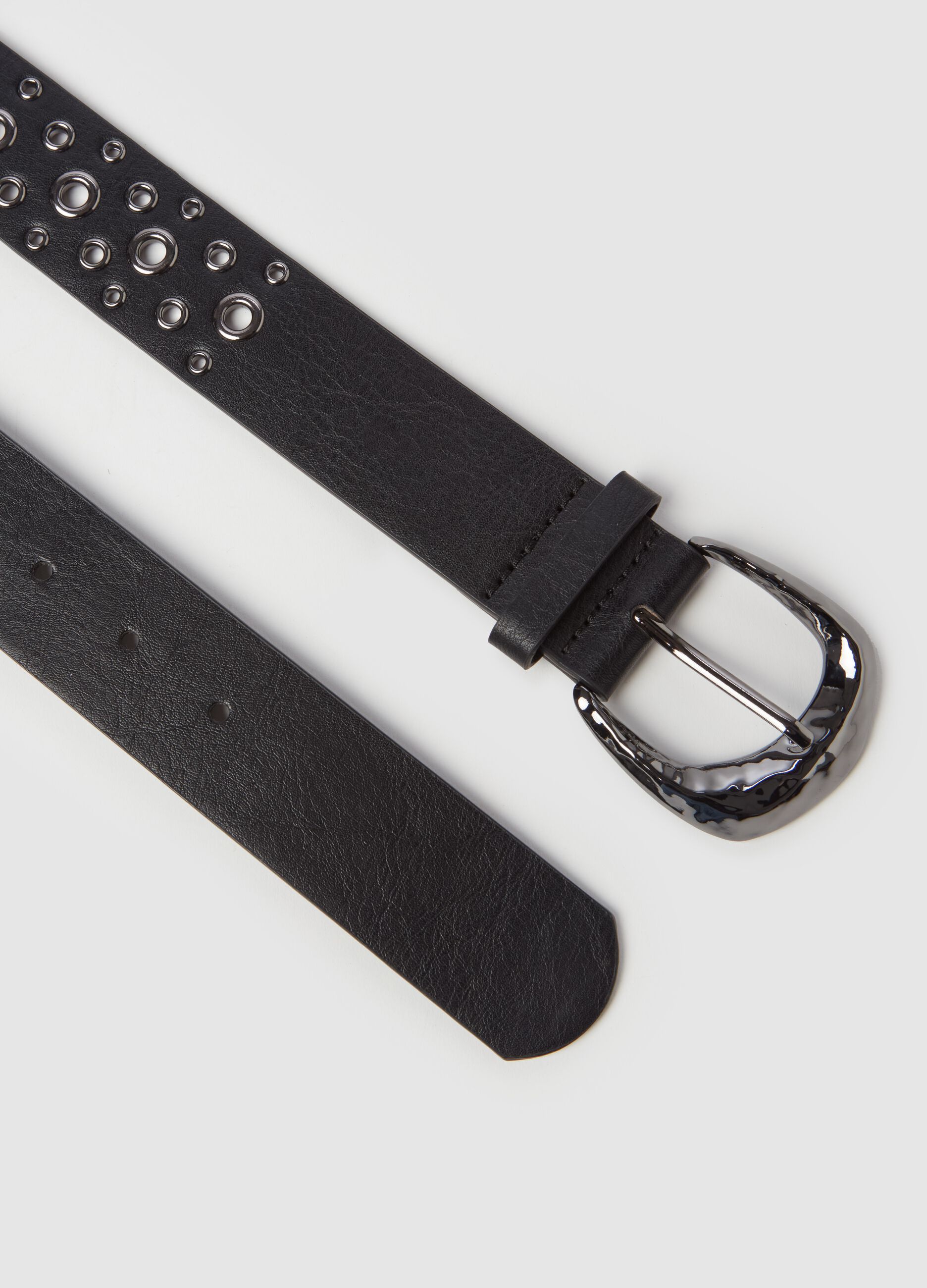 Belt with metal eyelets