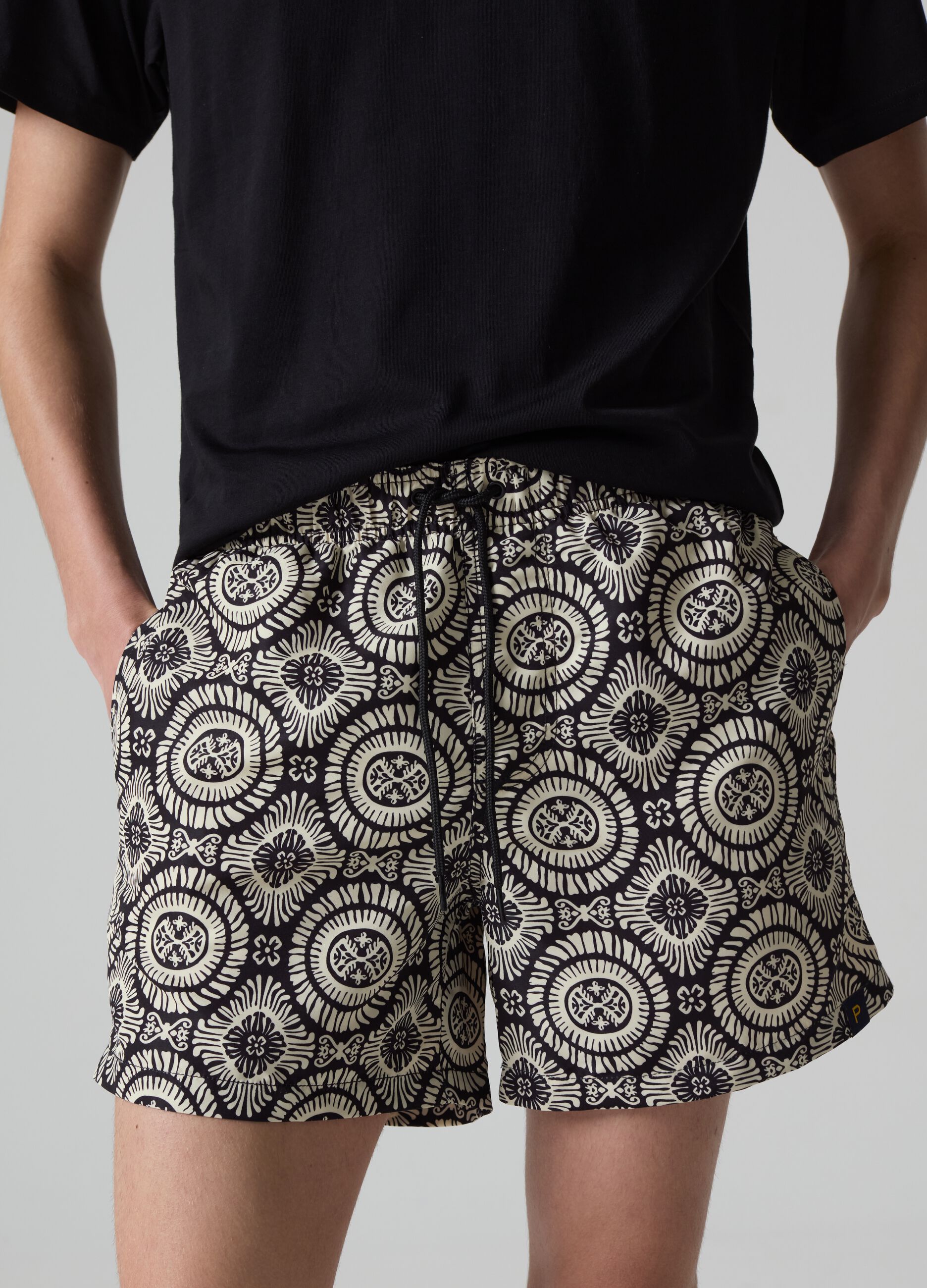 Bermuda swim shorts with Inca print