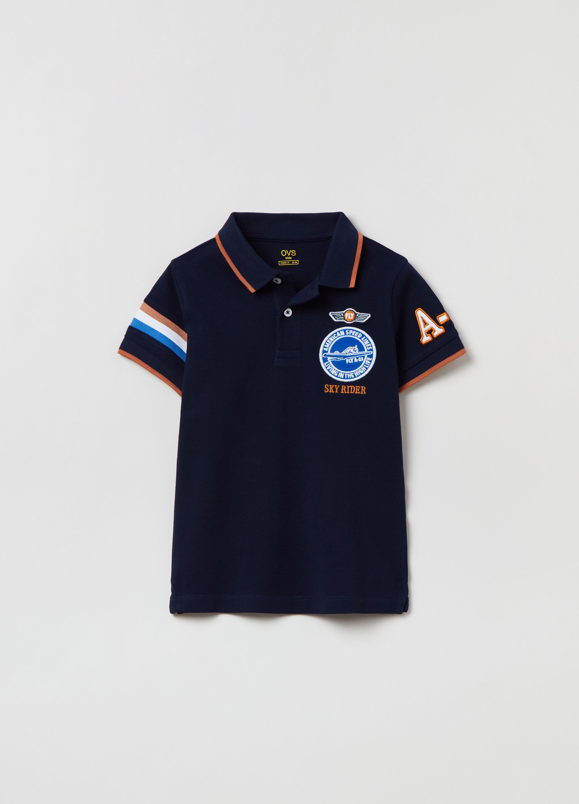 Polo in jersey con stampa e patch