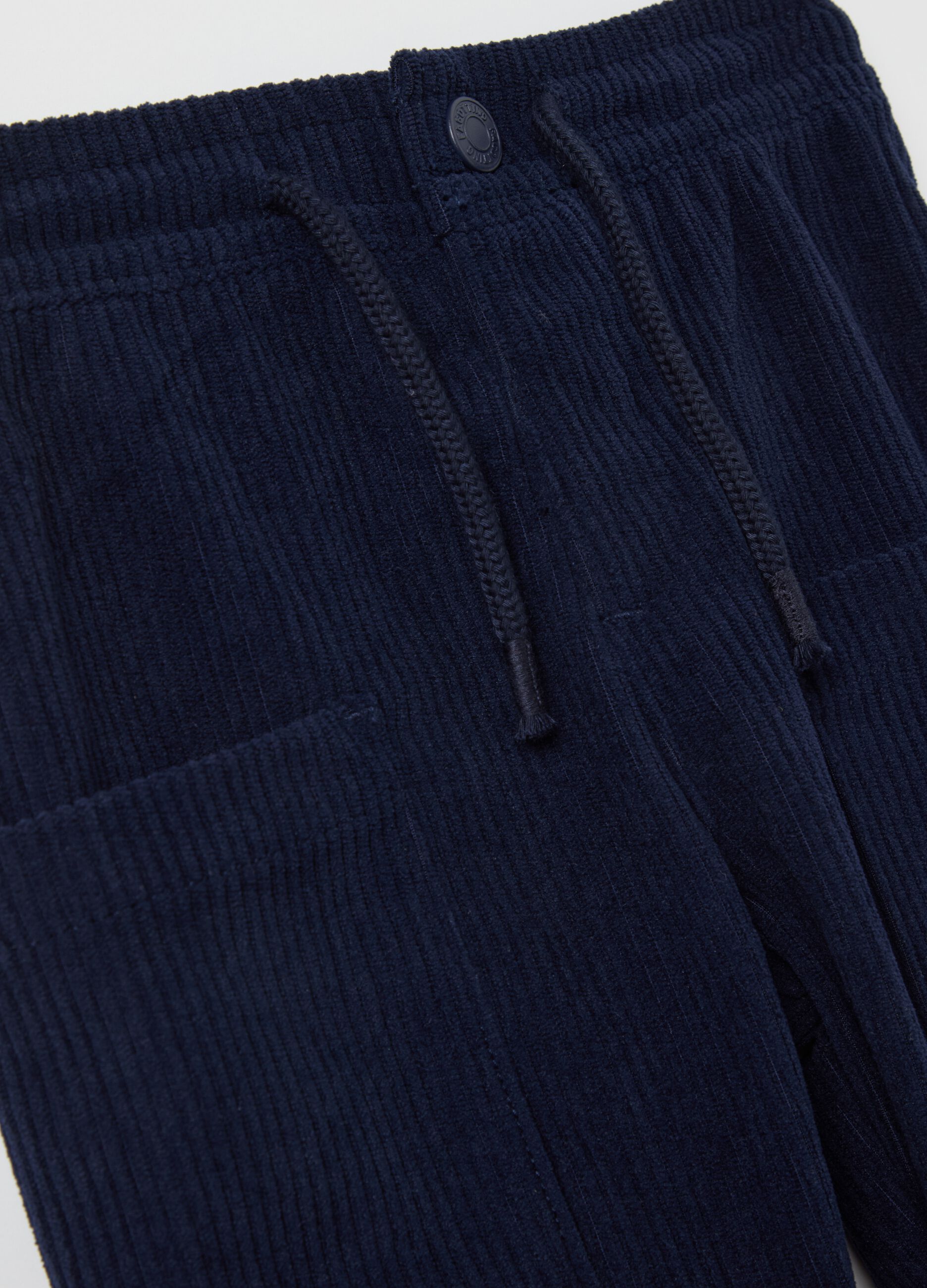 Corduroy trousers with pockets and drawstring