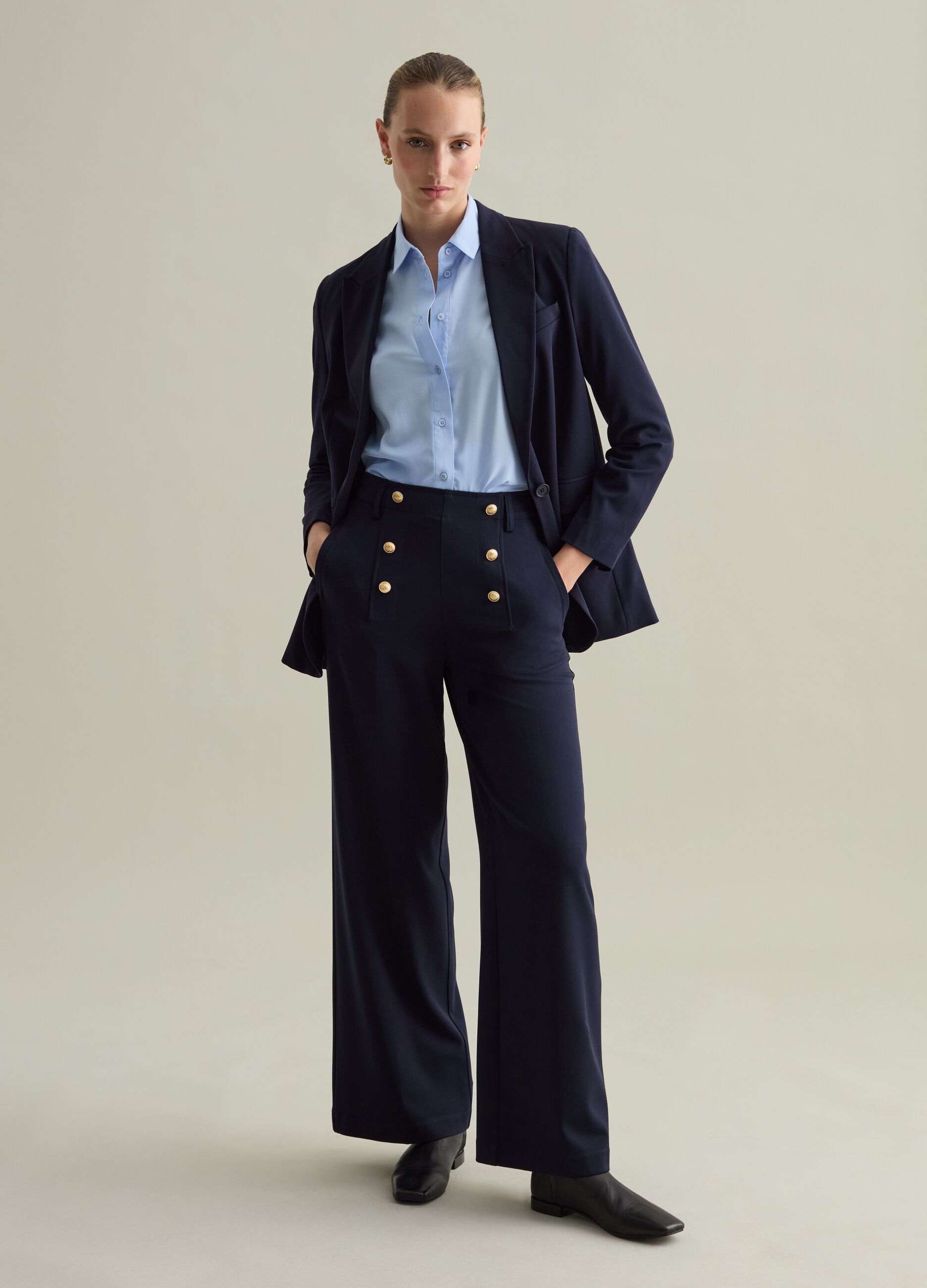 Contemporary wide-leg trousers with buttons