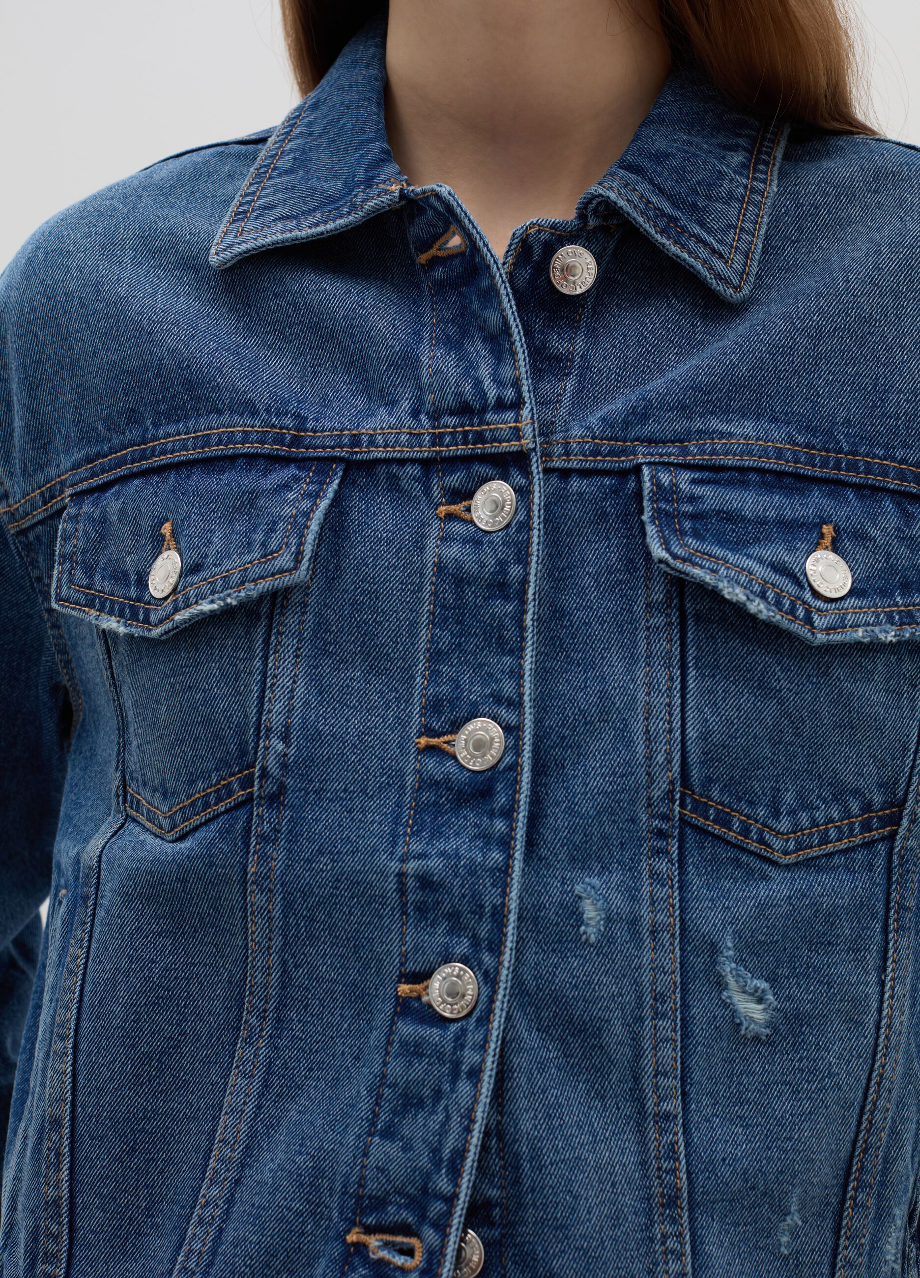 Denim jacket with abrasions