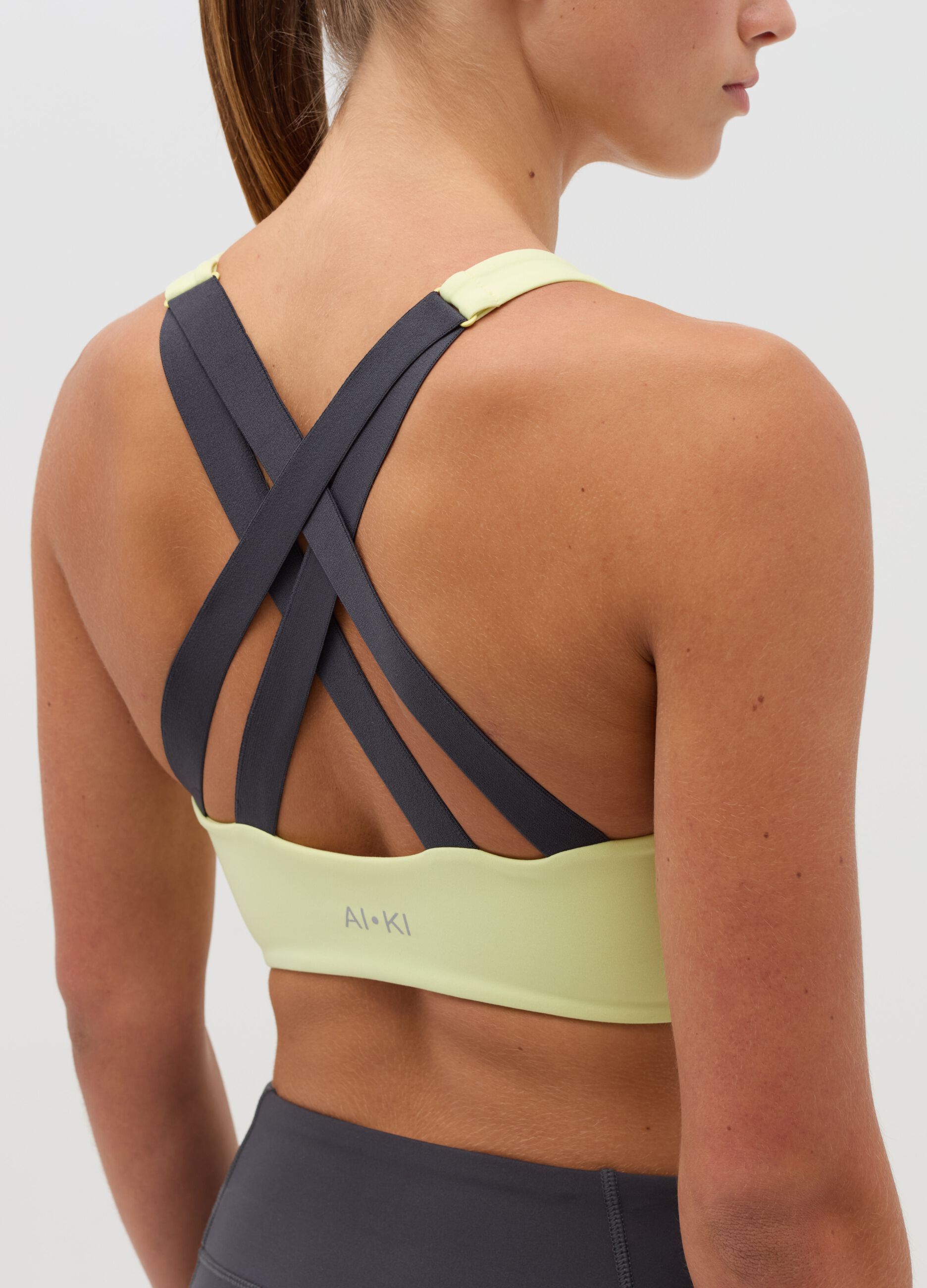 AI•KI sports bra with crossover straps