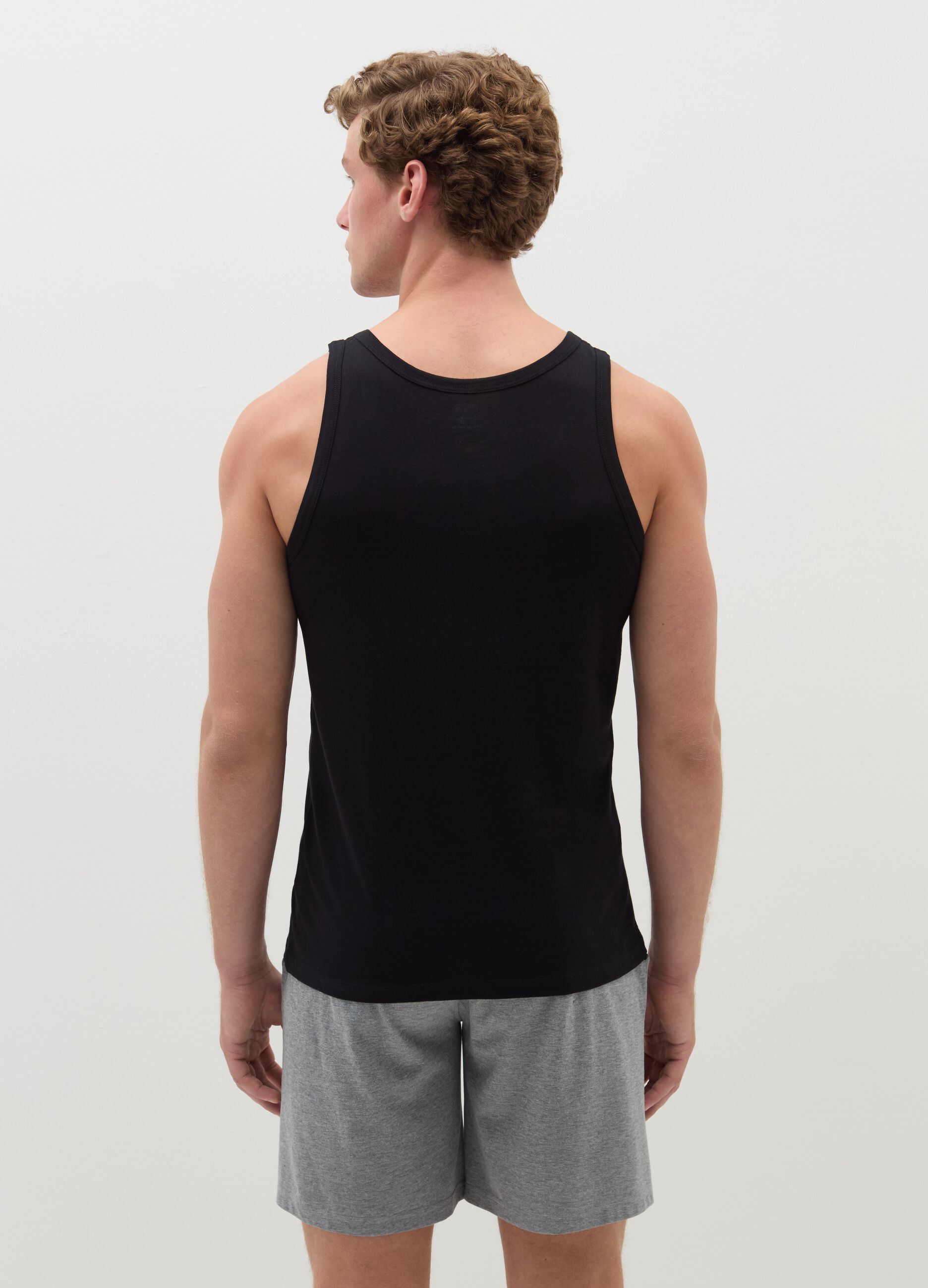 Three-pack racerback vests in organic cotton