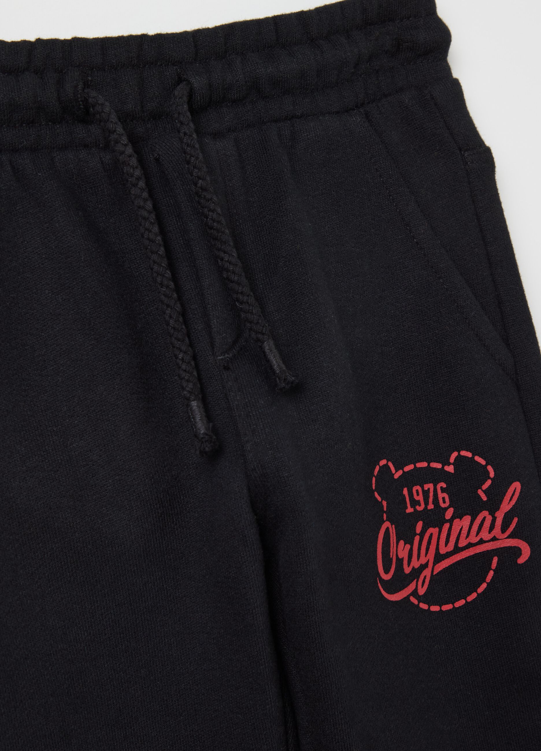 Fleece joggers with drawstring and print