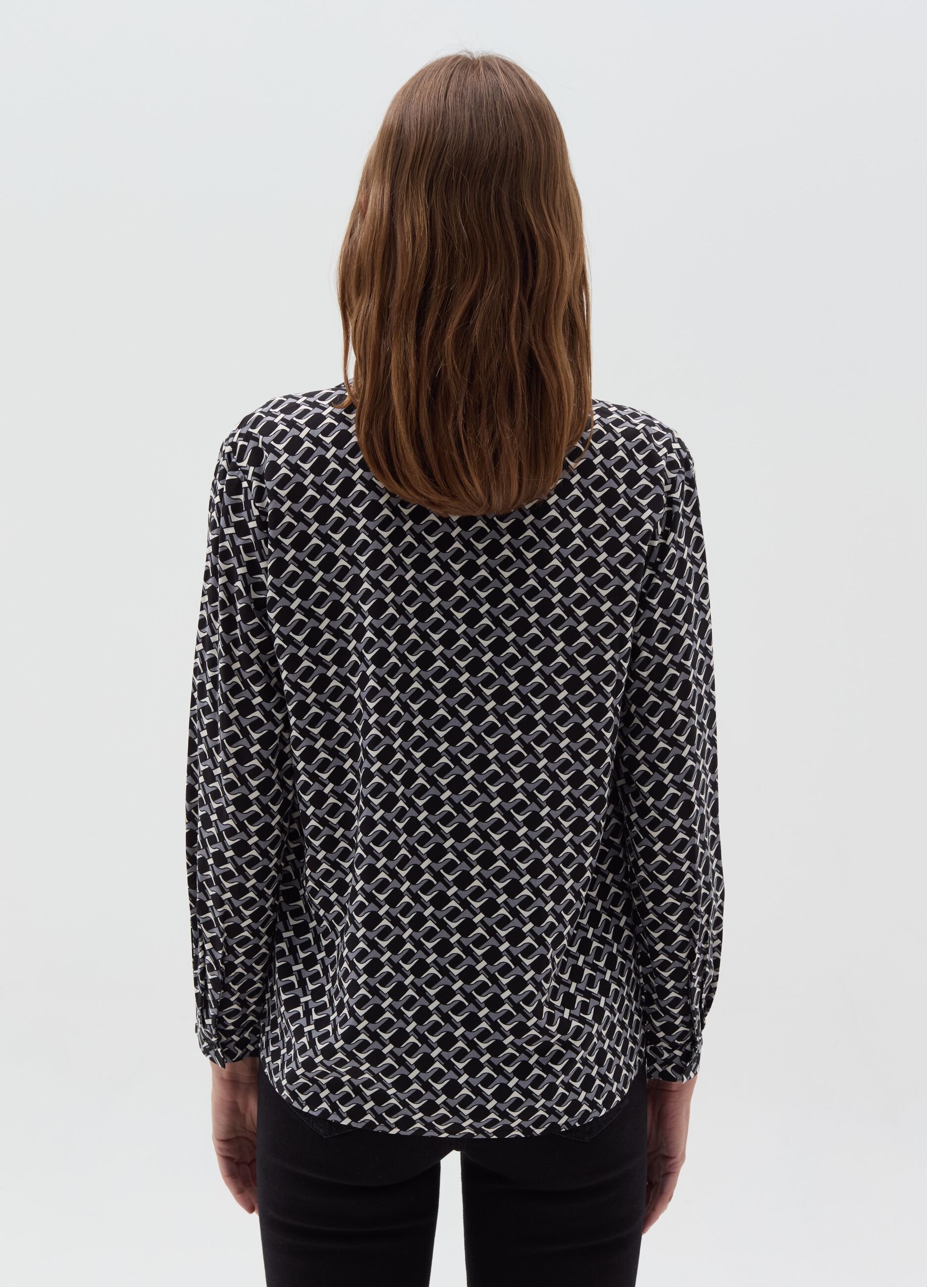 Blouse with polo neckline and long sleeves