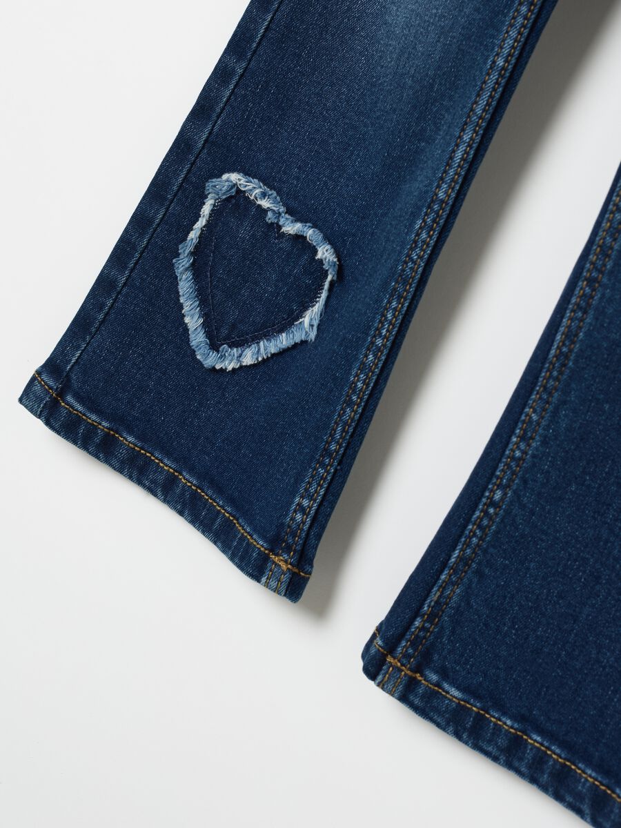 Flare-fit jeans with fringed hearts_3