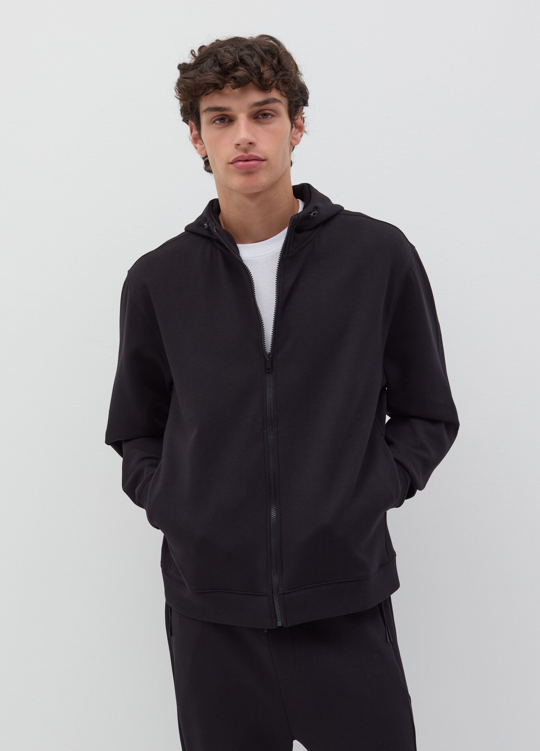 Full-zip fleece sweatshirt with hood and drawstring