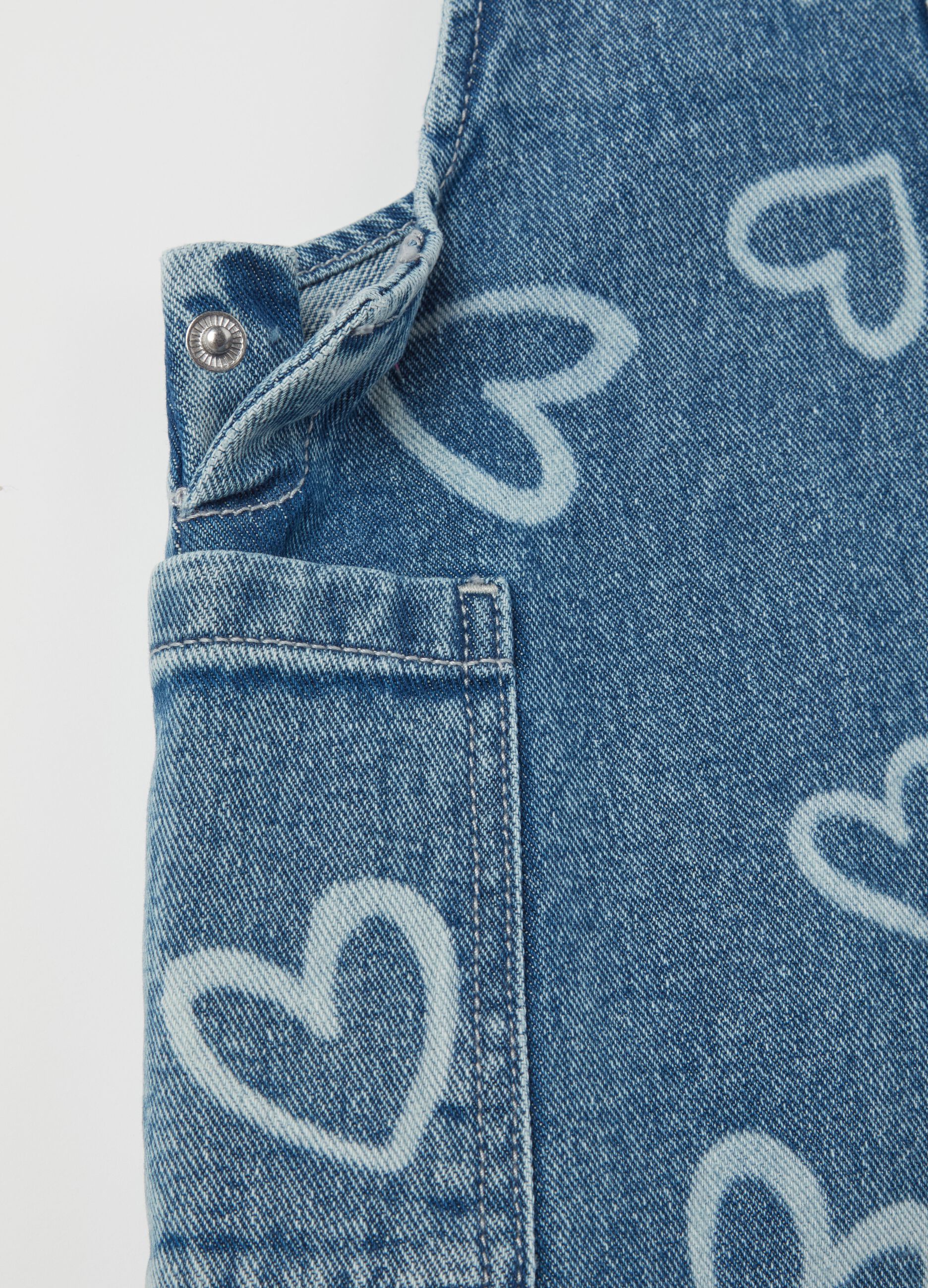 Denim pinafore with hearts print