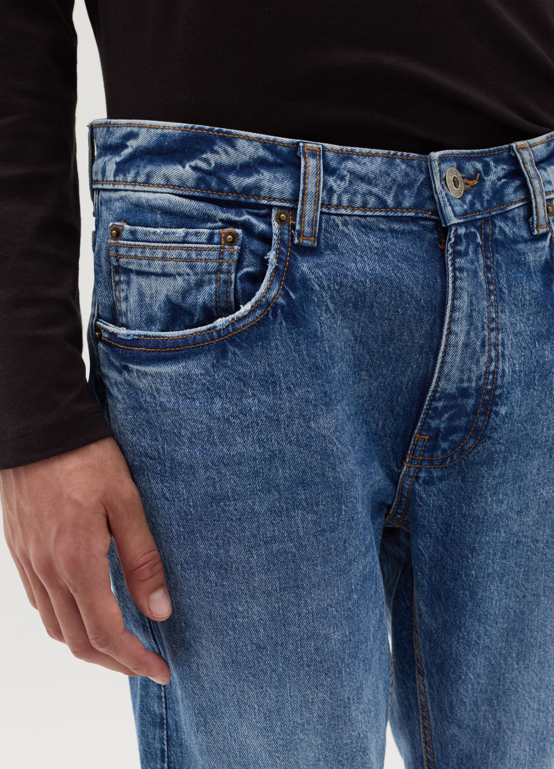 Slim-fit acid-wash jeans with fading