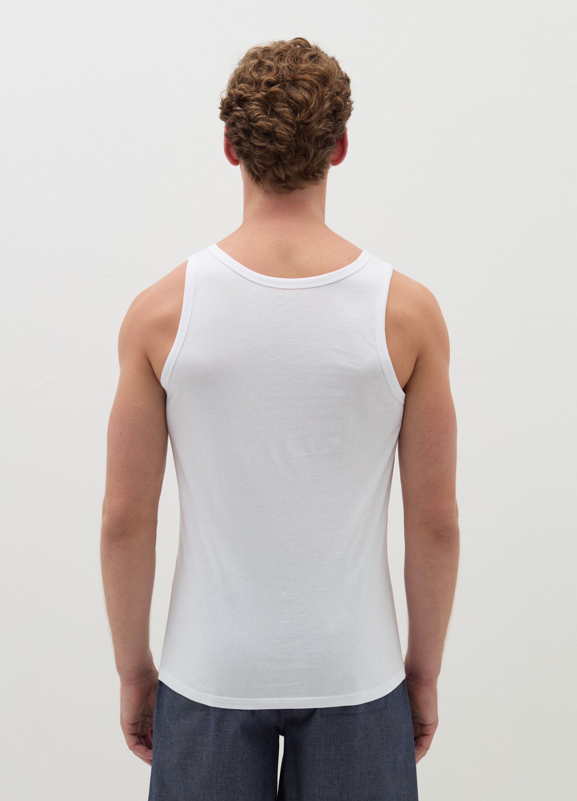 Three-pack racerback vests in organic cotton