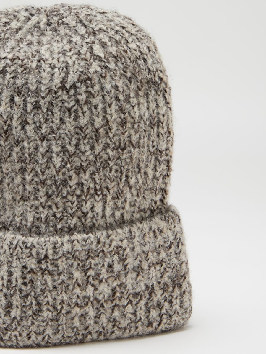 Knitted mélange hat with fold_2