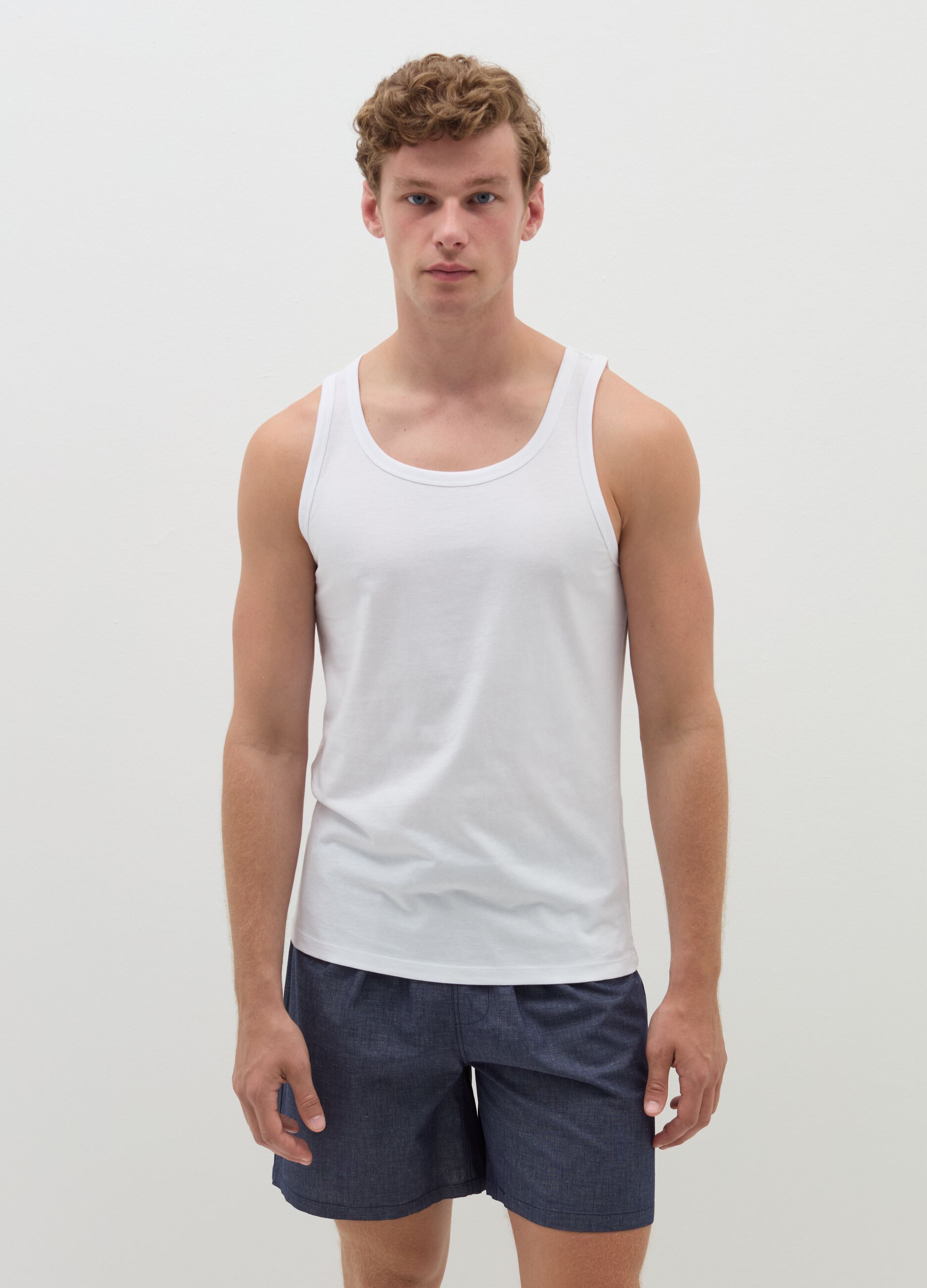 Three-pack racerback vests in organic cotton